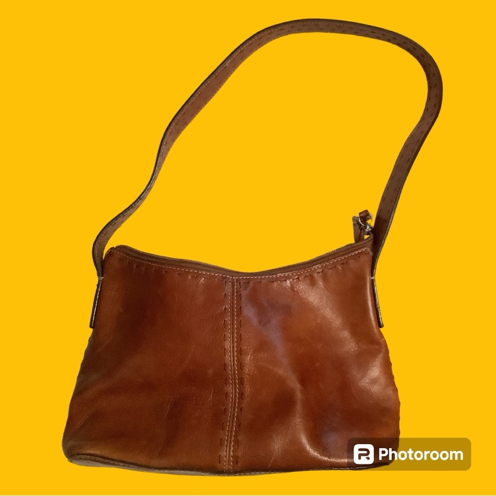 Fossil Brown Leather Crescent Bag. Zipper and sleeve pocket inside. Zips closed.